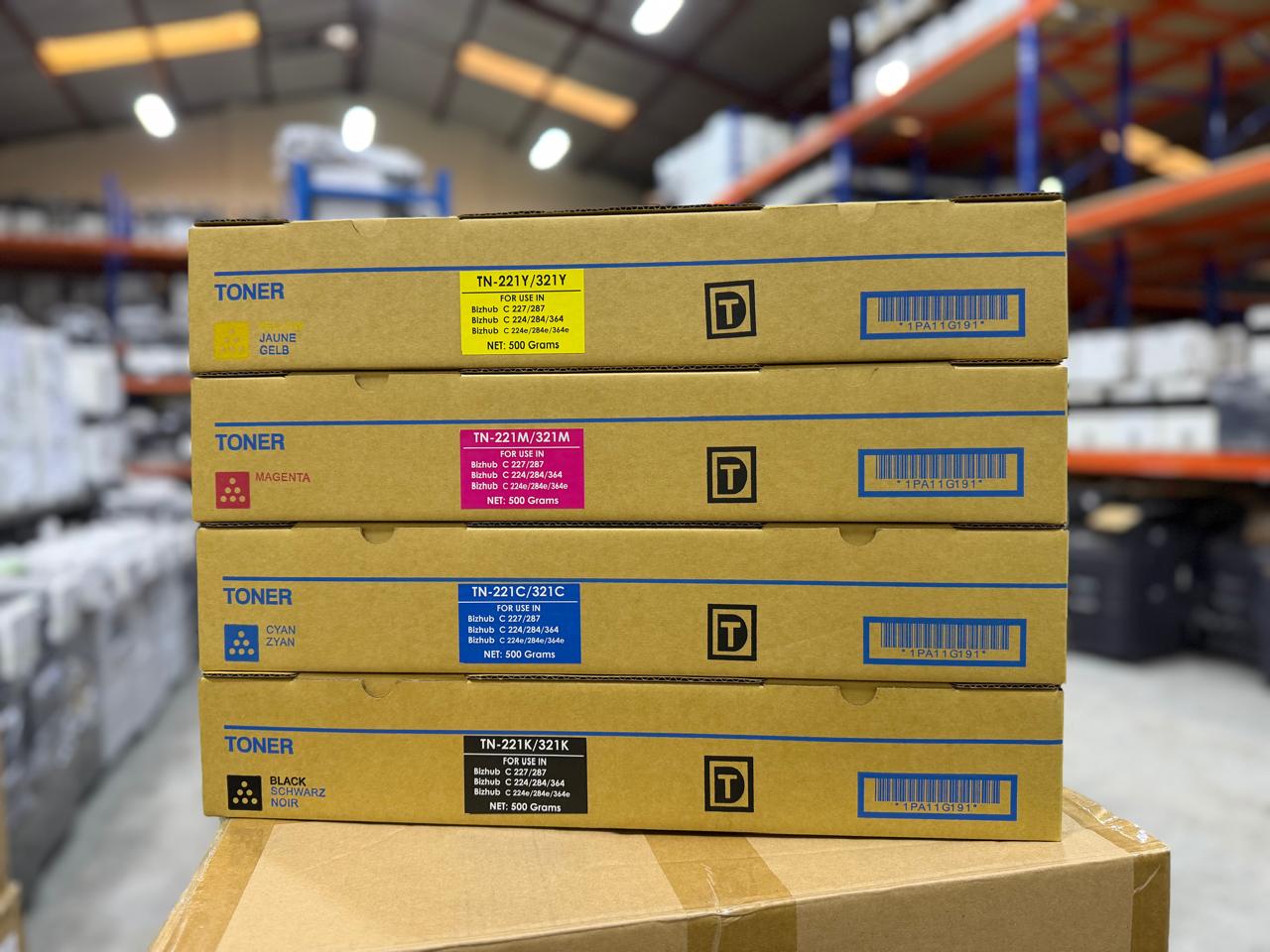 Toner cartridge boxes in black, cyan, magenta and yellow